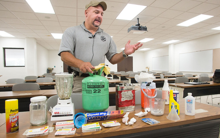 Illinois' Vermilion County Sheriff's deputy Patrick Alblinger talks about the area's meth problem and shows examples of lab components on Monday, Sept. 30, 2013.